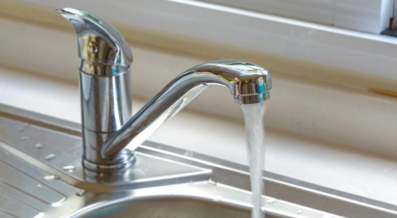 Kitchen faucet with a flowing water Faucet / Drinking Water