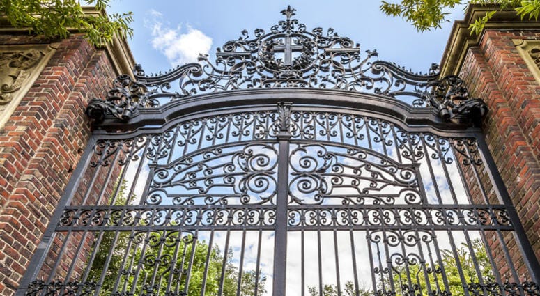 The historic gate of the famous Harvard University in Cambridge, Massachusetts The historic gate of the famous Harvard University in Cambridge, Massachusetts
