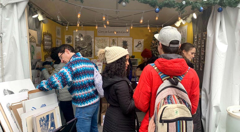 Shoppers at the pop-up holiday markets in Center City. Shoppers at the pop-up holiday markets in Center City.
