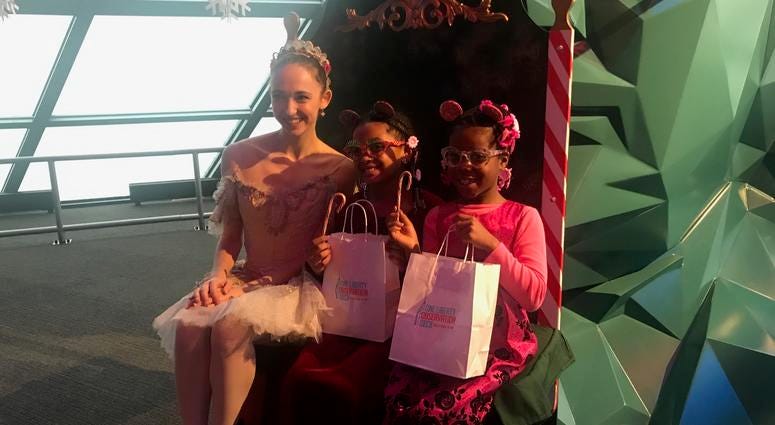 Dozens of families got a special holiday treat at one of the city's tallest buildings. Dozens of families got a special holiday treat at one of the city's tallest buildings.