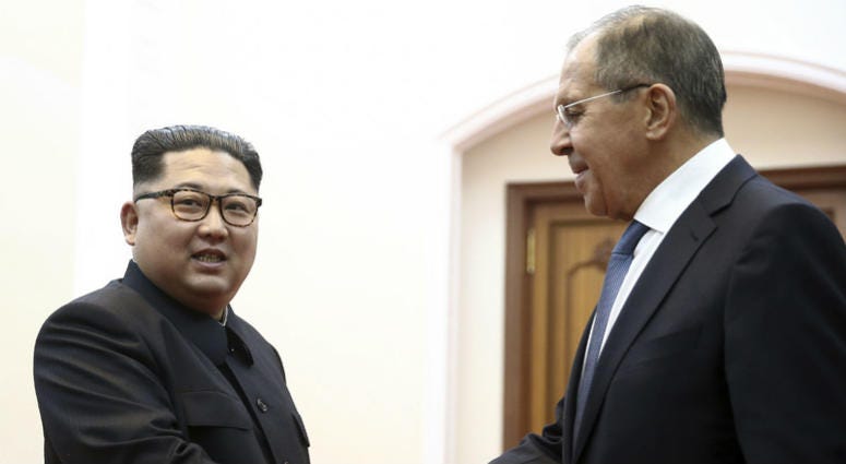 Korean leader Kim Jong Un, left, and Russia's Foreign Minister Sergei Lavrov shake hands during a meeting in Pyongyang, North Korea, Thursday, May 31, 2018. Korean leader Kim Jong Un, left, and Russia's Foreign Minister Sergei Lavrov
