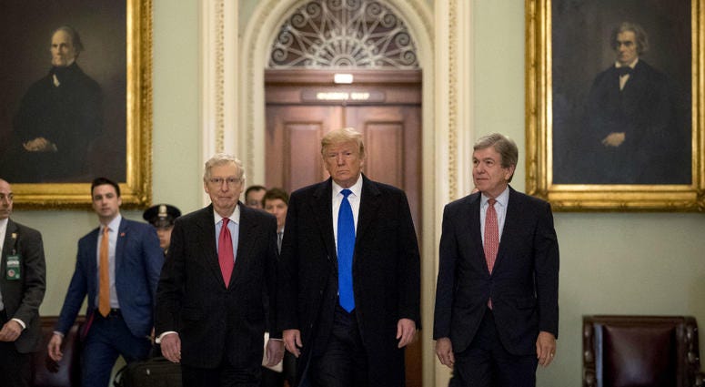 President Donald Trump accompanied by Senate Majority Leader Mitch McConnell of Ky., left, and Sen. Roy Blunt, R-Mo., right, arrives for a Senate Republican policy lunch on Capitol Hill in Washington, Tuesday, March 26, 2019. President Donald Trump accompanied by Senate Majority Leader Mitch McConnell of Ky., left, and Sen. Roy Blunt, R-Mo., right, arrives for a Senate Republican policy lunch on Capitol Hill in Washington, Tuesday, March 26, 2019.