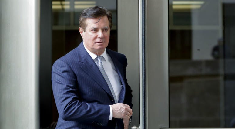 In this Feb. 14, 2018 file photo, Paul Manafort, President Donald Trump's former campaign chairman, leaves the federal courthouse in Washington. In this Feb. 14, 2018 file photo, Paul Manafort, President Donald Trump's former campaign chairman, leaves the federal courthouse in Washington.
