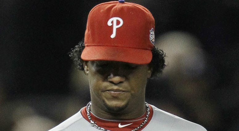 In this Nov. 4, 2009, file photo, Philadelphia Phillies' Pedro Martinez looks at his ball after giving up a two-run home run to New York Yankees' Hideki Matsui during the second inning of Game 6 of the Major League Baseball World Series in New York. In this Nov. 4, 2009, file photo, Philadelphia Phillies' Pedro Martinez looks at his ball after giving up a two-run home run to New York Yankees' Hideki Matsui during the second inning of Game 6 of the Major League Baseball World Series in New York.