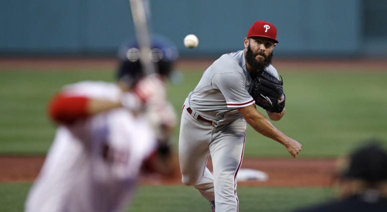 Philadelphia Phillies starting pitcher Jake Arrieta delivers during the first inning of a baseball game against the Boston Red Sox at Fenway Park in Boston, Tuesday, July 31, 2018. Philadelphia Phillies starting pitcher Jake Arrieta delivers during the first inning of a baseball game against the Boston Red Sox at Fenway Park in Boston, Tuesday, July 31, 2018.
