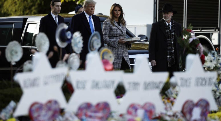 President Donald Trump, first lady Melania Trump, Ivanka Trump and Jared Kushner visit a memorial outside Pittsburgh's Tree of Life Synagogue in Pittsburgh, Tuesday, Oct. 30, 2018. President Donald Trump, first lady Melania Trump, Ivanka Trump and Jared Kushner visit a memorial outside Pittsburgh's Tree of Life Synagogue in Pittsburgh, Tuesday, Oct. 30, 2018.