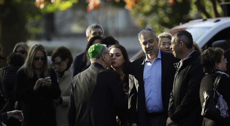 Mourners gather outside Rodef Shalom Congregation before the funeral services for brothers Cecil and David Rosenthal, Tuesday, Oct. 30, 2018, in Pittsburgh. Mourners gather outside Rodef Shalom Congregation before the funeral services for brothers Cecil and David Rosenthal, Tuesday, Oct. 30, 2018, in Pittsburgh.