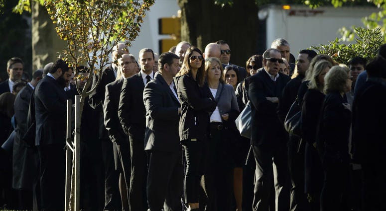 Mourners gather outside Rodef Shalom Congregation before the funeral services for brothers Cecil and David Rosenthal, Tuesday, Oct. 30, 2018, in Pittsburgh. Mourners gather outside Rodef Shalom Congregation before the funeral services for brothers Cecil and David Rosenthal, Tuesday, Oct. 30, 2018, in Pittsburgh.
