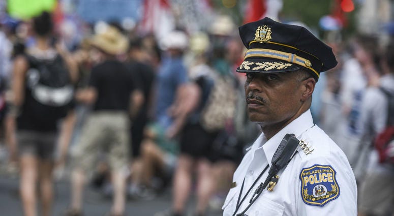 Philadelphia police commissioner Richard Ross Jr. kept an eye as Bernie Sanders supporters march down Broad Street during the Democratic National Convention. Philadelphia police commissioner Richard Ross Jr. kept an eye as Bernie Sanders supporters march down Broad Street during the Democratic National Convention.