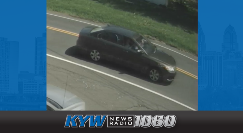 A passenger in this car took a shot at a driver who honked his horn. A passenger in this car took a shot at a driver who honked his horn.