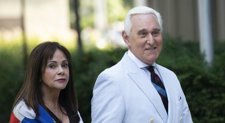 Roger Stone, a longtime confidant of President Donald Trump, accompanied by his wife Nydia Stone, left, arrives at federal court in Washington, Tuesday, July 16, 2019. Roger Stone, a longtime confidant of President Donald Trump, accompanied by his wife Nydia Stone, left, arrives at federal court in Washington, Tuesday, July 16, 2019.
