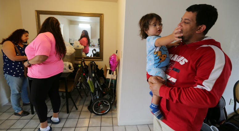 Left to right, Liza Hernandez, Christine Gonzalez, Kahil Olmeda Gonzalez and dad David Olmeda, at the Super 8 motel in Kissimmee, Fla., on May 25, 2018. They are staying in motels after evacuating the island in the wake of hurricane Maria. Left to right, Liza Hernandez, Christine Gonzalez, Kahil Olmeda Gonzalez and dad David Olmeda, at the Super 8 motel in Kissimmee, Fla., on May 25, 2018. They are staying in motels after evacuating the island in the wake of hurricane Maria.
