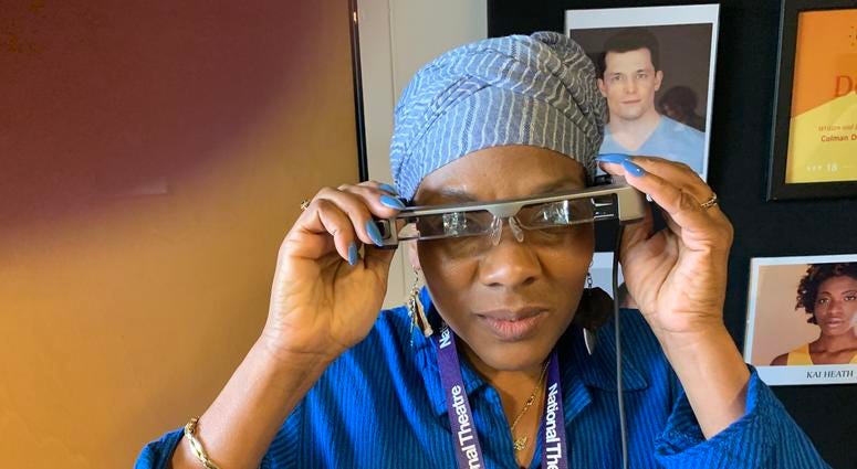 Cheryl Johnson, West Philadelphia, who suffers from hearing loss, puts on her Smart Caption Glasses which she described as "amazing" in helping her to follow the performance of "Dot" at People's Light in Malvern, Chester County. Cheryl Johnson, West Philadelphia, who suffers from hearing loss, puts on her smart caption glasses which she described as "amazing" in helping her to follow the performance of "Dot" at People's Light in Malvern, Chester County.