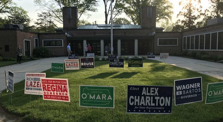 Voters get an early start on Primary Day at the Springfield Township building in Delaware County. Voters get an early start on Primary Day at the Springfield Township building
