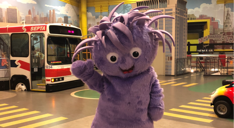 The Please Touch Museum has introduced its new mascot, a purple, fuzzy, wide-eyed creature named Squiggles. The Please Touch Museum has introduced its new mascot, a purple, fuzzy, wide-eyed creature named Squiggles.