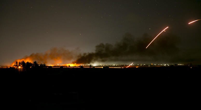 U.S.-backed Syrian Democratic Forces (SDF) fire on Islamic State militant positions in Baghouz, Syria, Monday, March 11, 2019. U.S.-backed Syrian Democratic Forces (SDF) fire on Islamic State militant positions in Baghouz, Syria, Monday, March 11, 2019.