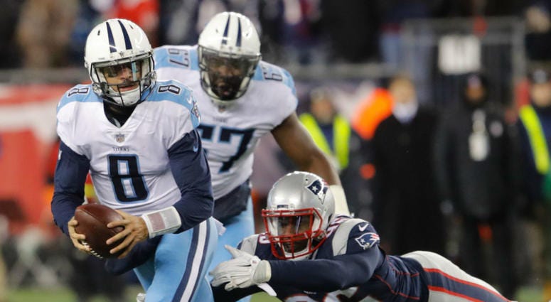 New England Patriots linebacker Geneo Grissom (96) sacks Tennessee Titans quarterback Marcus Mariota (8) in the AFC Divisional playoff game at Gillette Stadium. New England Patriots linebacker Geneo Grissom (96) sacks Tennessee Titans quarterback Marcus Mariota (8) in the AFC Divisional playoff game at Gillette Stadium.