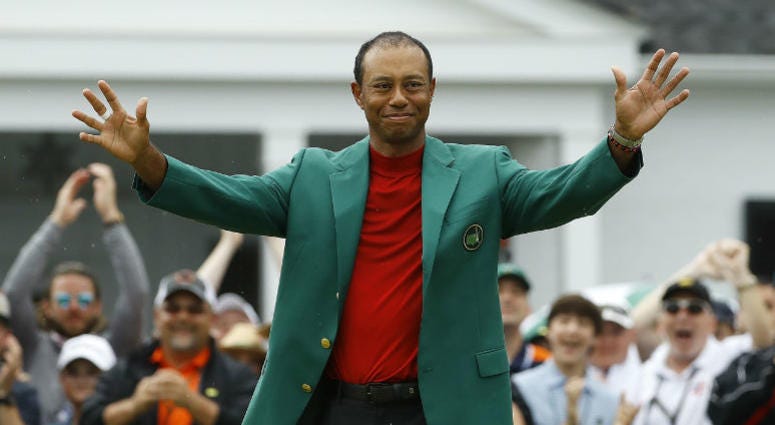 Tiger Woods smiles as he wears his green jacket after winning the Masters golf tournament Sunday, April 14, 2019, in Augusta, Ga. Tiger Woods smiles as he wears his green jacket after winning the Masters golf tournament Sunday, April 14, 2019, in Augusta, Ga.