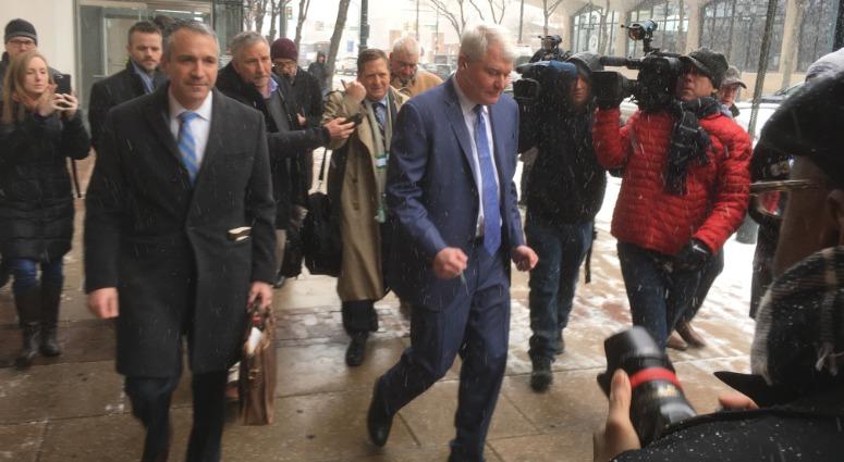 John Dougherty (center) leaves his first court appearance following the public corruption indictment against him, Feb. 1, 2019. John Dougherty (center) leaves his first court appearance.