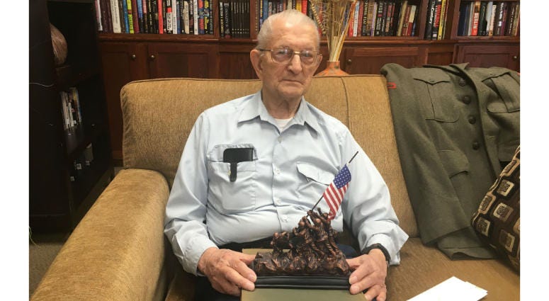 John Murach enlisted in the Marines at age 17. He fought in the Battle of Iwo Jima in 1945. Former Marine John Murach