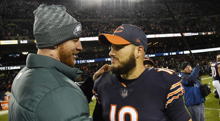 Chicago Bears quarterback Mitchell Trubisky (10) greets Philadelphia Eagles quarterback Carson Wentz (left) after a NFC Wild Card playoff football game at Soldier Field. Chicago Bears quarterback Mitchell Trubisky (10) greets Philadelphia Eagles quarterback Carson Wentz (left) after a NFC Wild Card playoff football game at Soldier Field.