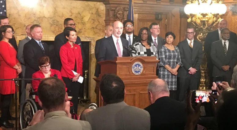 Pa. Gov. Tom Wolf, surrounded by supporters, announces his minimum wage proposal at the Capitol in Harrisburg. Pa. Gov. Tom Wolf, surrounded by supporters, announces his minimum wage proposal at the Capitol in Harrisburg.
