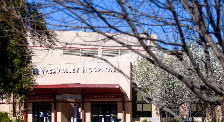 A person enters NorthBay VacaValley Hospital, where a woman diagnosed with coronavirus previously sought treatment, on Thursday, Feb. 27, 2020, in Vacaville, Calif. A person enters NorthBay VacaValley Hospital, where a woman diagnosed with coronavirus previously sought treatment, on Thursday, Feb. 27, 2020, in Vacaville, Calif.