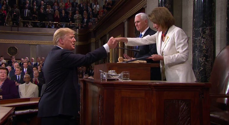 President Donald Trump and Speaker of the House Nancy Pelosi shake before the State of the Union address Tuesday night. Donald Trump and Nancy Pelosi
