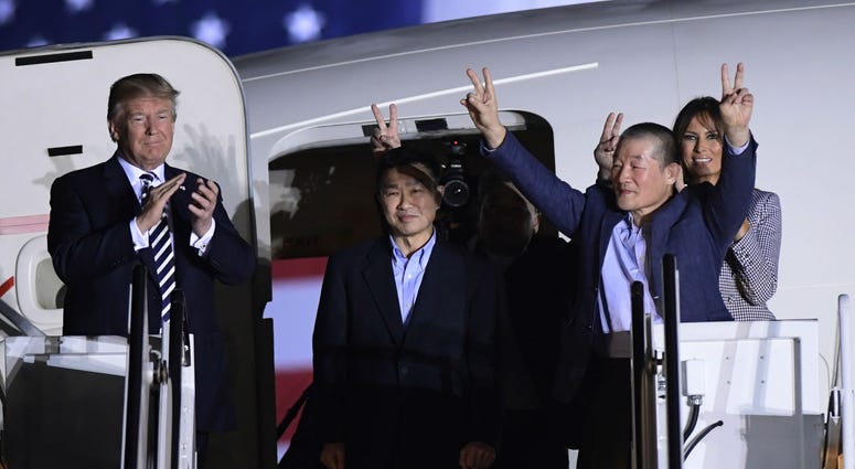 President Donald Trump, from left, greets Tony Kim, Kim Hak Song, seen in the shadow, and Kim Dong Chul, three Americans detained in North Korea for more than a year, as they arrive at Andrews Air Force Base in Md., Thursday, May 10, 2018. President Donald Trump, from left, greets Tony Kim, Kim Hak Song, seen in the shadow, and Kim Dong Chul, three Americans detained in North Korea for more than a year, as they arrive at Andrews Air Force Base in Md., Thursday, May 10, 2018.