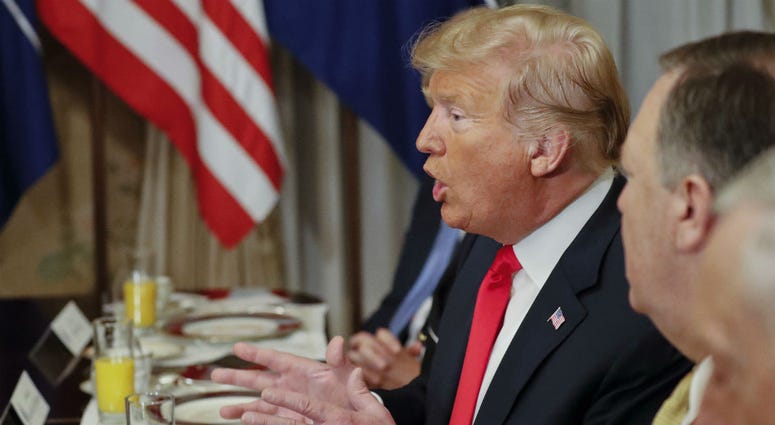 U.S. President Donald Trump gestures while speaking to NATO Secretary General Jens Stoltenberg during their bilateral breakfast, Wednesday, July 11, 2018 in Brussels, Belgium. U.S. President Donald Trump gestures while speaking to NATO Secretary General Jens Stoltenberg during their bilateral breakfast, Wednesday, July 11, 2018 in Brussels, Belgium.