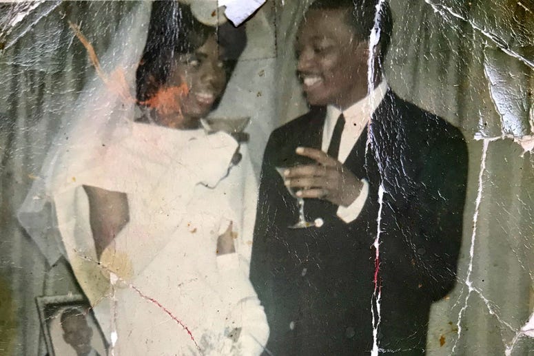 Tyrone Smith is shown wearing a wedding dress on the day he spoke vows to the love of his life. Tyrone Smith is shown wearing a wedding dress on the day he spoke vows to the love of his life.