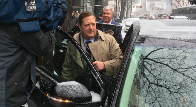 Defense lawyer Henry Hockeimer (front) and John Dougherty (back) leave Dougherty's first court appearance following the public corruption indictment, Feb. 1, 2019. Defense lawyer Henry Hockeimer (front) and John Dougherty (back) leave Dougherty's first court appearance following the public corruption indictment, Feb. 1, 2019.