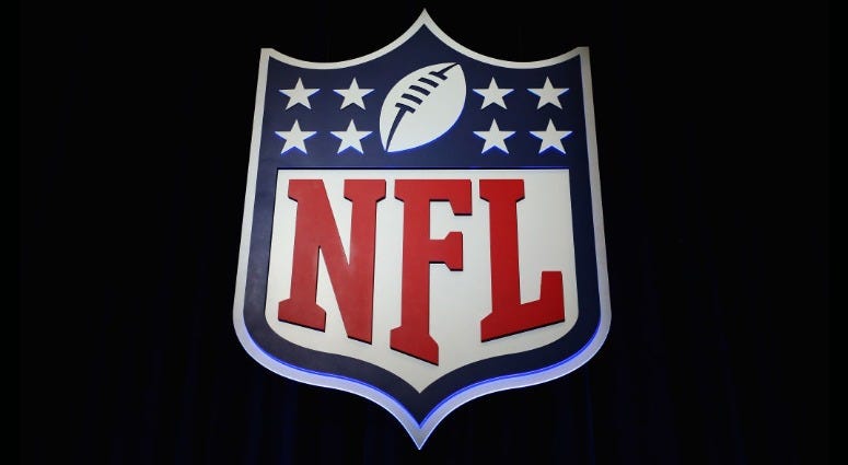 The NFL shield logo The NFL shield logo