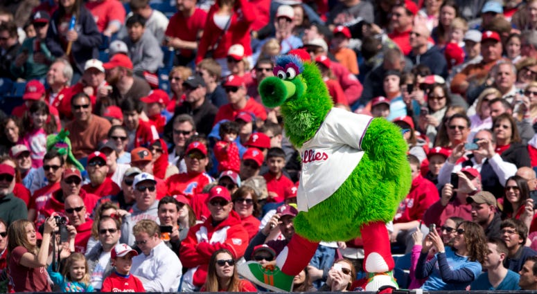 The Phillie Phanatic dances on the dugout during the bottom of the seventh inning against the Atlanta Braves on April 17, 2014 at Citizens Bank Park in Philadelphia, Pennsylvania. Phillie Phanatic