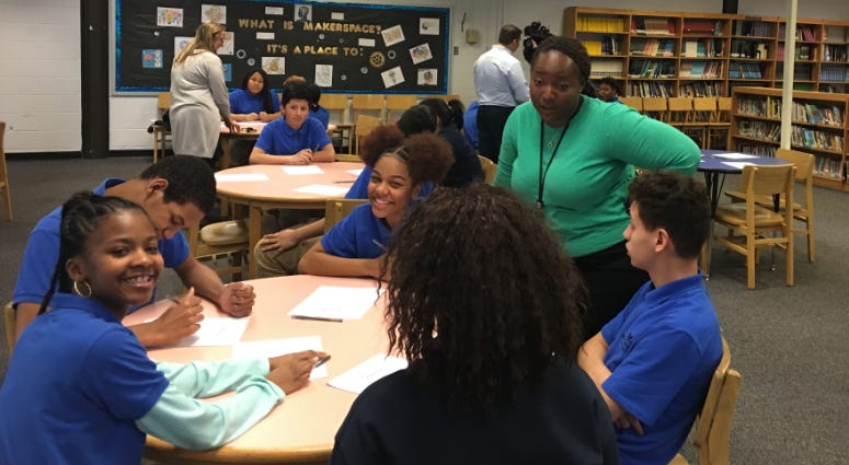 Mastery East Camden Charter School Principal Meaghann Lawson engages with students during a presentation on engineering as a career path. Mastery East Camden Charter School Principal Meaghann Lawson engages with students during a presentation on engineering as a career path.