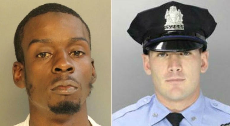 Jerome Hill (left) and Officer Paul Sulock Jerome Hill and Officer Paul Sulock