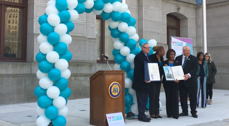Mayor Jim Kenney and representatives from WOAR announce Teal Day at City Hall, April 11, 2019. Teal Day
