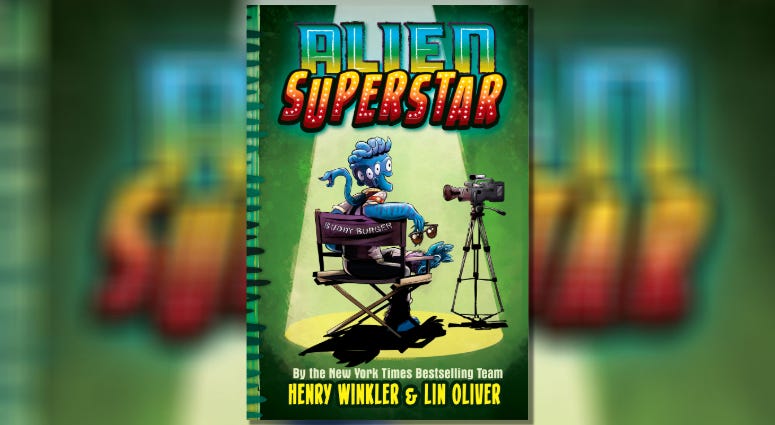 This cover image released by Abrams shows "Alien Superstar," by Henry Winkler and Lin Oliver. "Alien Superstar"
