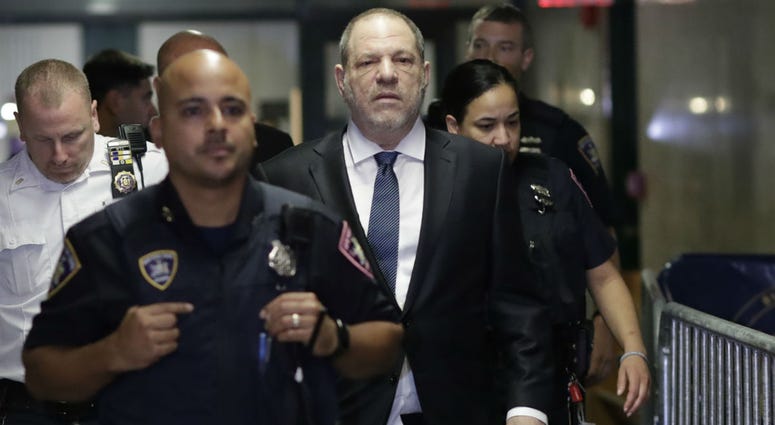 Harvey Weinstein, center, enters State Supreme Court, Thursday, Oct. 11, 2018 in New York. Harvey Weinstein, center, enters State Supreme Court, Thursday, Oct. 11, 2018 in New York.
