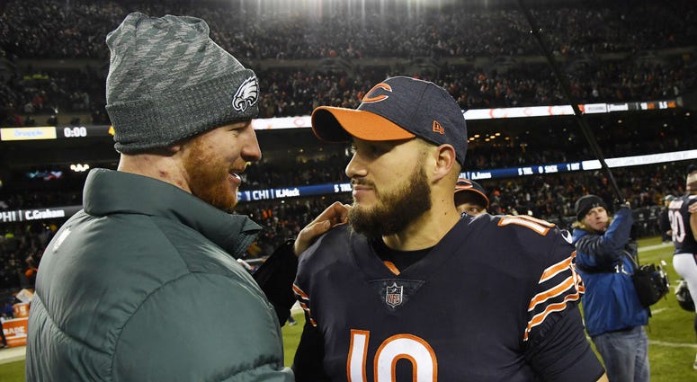 Chicago Bears quarterback Mitchell Trubisky (10) greets Philadelphia Eagles quarterback Carson Wentz (left) after a NFC Wild Card playoff football game at Soldier Field. Chicago Bears quarterback Mitchell Trubisky (10) greets Philadelphia Eagles quarterback Carson Wentz (left) after a NFC Wild Card playoff football game at Soldier Field.
