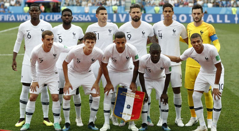 France's starting players pose for a team photo at the beginning of he quarterfinal match between Uruguay and France at the 2018 soccer World Cup in the Nizhny Novgorod Stadium, in Nizhny Novgorod, Russia. France's starting players pose for a team photo at the beginning of he quarterfinal match between Uruguay and France at the 2018 soccer World Cup in the Nizhny Novgorod Stadium, in Nizhny Novgorod, Russia.
