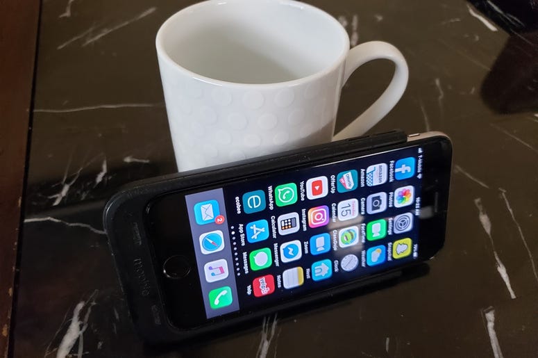 phone on coffee cup