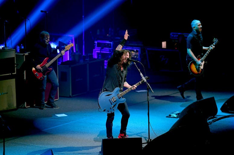 Nate Mendel, Dave Grohl and Pat Smear of the Foo Fighters perform onstage at DIRECTV Super Saturday Night 2019 Nate Mendel, Dave Grohl and Pat Smear of the Foo Fighters perform onstage at DIRECTV Super Saturday Night 2019