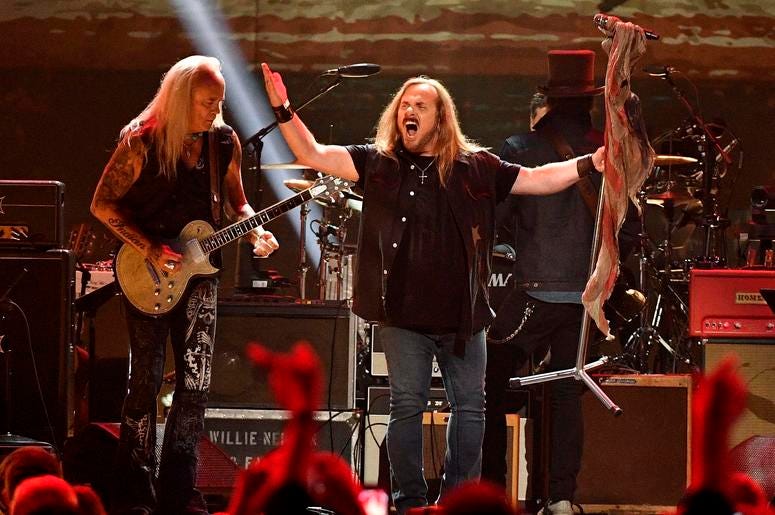 Members of Lynyrd Skynyrd perform during the Merle Haggard Tribute concert Members of Lynyrd Skynyrd perform during the Merle Haggard Tribute concert