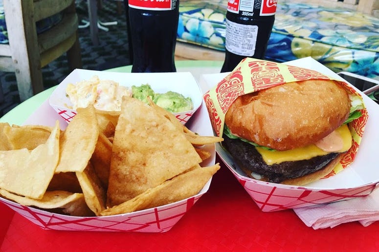 The All American with a side of chips and guac/pimento cheese