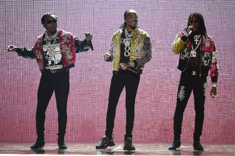 LOS ANGELES - JUNE 24: Migos perform on the 2018 BET Awards at the Microsoft Theater on June 24, 2018 in Los Angeles, California. LOS ANGELES - JUNE 24: Migos perform on the 2018 BET Awards at the Microsoft Theater on June 24, 2018 in Los Angeles, California.