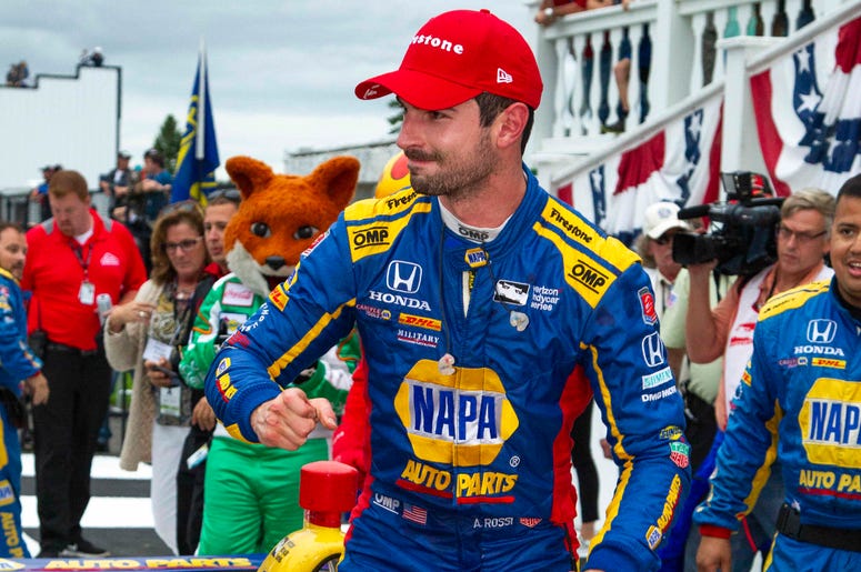 Aug 19, 2018; Long Pond, PA, USA; Verizon IndyCar Series driver Alexander Rossi celebrates in victory lane after winning the ABC Supply 500 at Pocono Raceway. Aug 19, 2018; Long Pond, PA, USA; Verizon IndyCar Series driver Alexander Rossi celebrates in victory lane after winning the ABC Supply 500 at Pocono Raceway.