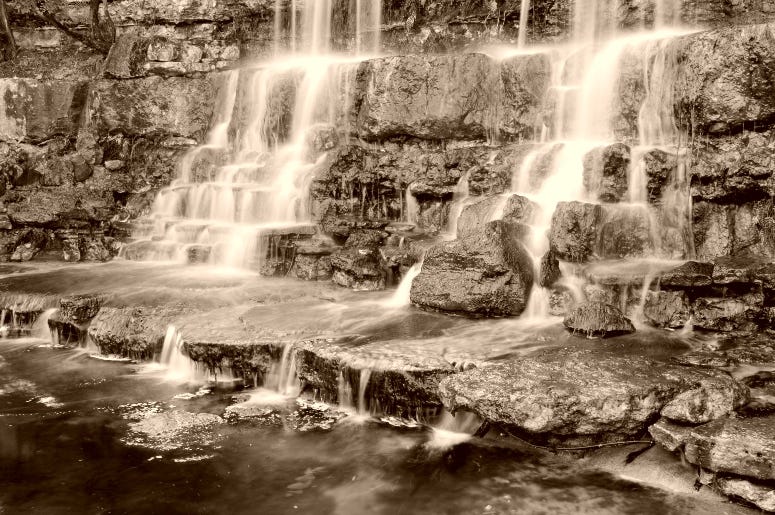 Waterfall in Zilker Botanical Gardens in ATX / timsdd Getty Image