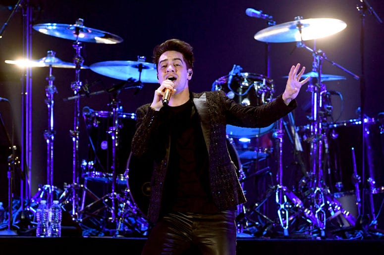 Brendon Urie of Panic! at the Disco performs onstage Brendon Urie of Panic! at the Disco performs onstage