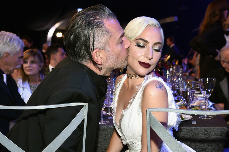 Christian Carino (L) and Lady Gaga during the 25th Annual Screen Actors Guild Awards at The Shrine Auditorium on January 27, 2019 in Los Angeles, California Christian Carino (L) and Lady Gaga during the 25th Annual Screen Actors Guild Awards at The Shrine Auditorium on January 27, 2019 in Los Angeles, California